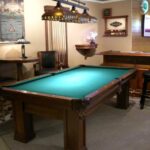 Play pool near you Winnipeg billiards tables cues